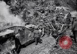 Image of British Mark I tank (male) followed by Allied troops France, 1916, second 14 stock footage video 65675028139