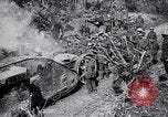 Image of British Mark I tank (male) followed by Allied troops France, 1916, second 15 stock footage video 65675028139