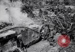 Image of British Mark I tank (male) followed by Allied troops France, 1916, second 16 stock footage video 65675028139