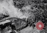 Image of British Mark I tank (male) followed by Allied troops France, 1916, second 17 stock footage video 65675028139