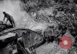 Image of British Mark I tank (male) followed by Allied troops France, 1916, second 18 stock footage video 65675028139