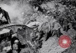 Image of British Mark I tank (male) followed by Allied troops France, 1916, second 20 stock footage video 65675028139