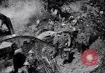 Image of British Mark I tank (male) followed by Allied troops France, 1916, second 21 stock footage video 65675028139
