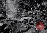Image of British Mark I tank (male) followed by Allied troops France, 1916, second 26 stock footage video 65675028139