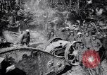 Image of British Mark I tank (male) followed by Allied troops France, 1916, second 28 stock footage video 65675028139