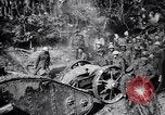 Image of British Mark I tank (male) followed by Allied troops France, 1916, second 29 stock footage video 65675028139