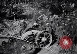 Image of British Mark I tank (male) followed by Allied troops France, 1916, second 31 stock footage video 65675028139
