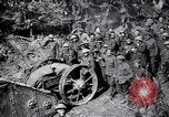 Image of British Mark I tank (male) followed by Allied troops France, 1916, second 33 stock footage video 65675028139