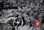 Image of British Mark I tank (male) followed by Allied troops France, 1916, second 34 stock footage video 65675028139