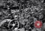 Image of British Mark I tank (male) followed by Allied troops France, 1916, second 36 stock footage video 65675028139