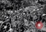 Image of British Mark I tank (male) followed by Allied troops France, 1916, second 37 stock footage video 65675028139