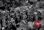 Image of British Mark I tank (male) followed by Allied troops France, 1916, second 38 stock footage video 65675028139