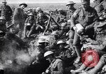 Image of British Mark I tank (male) followed by Allied troops France, 1916, second 46 stock footage video 65675028139