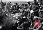 Image of British Mark I tank (male) followed by Allied troops France, 1916, second 47 stock footage video 65675028139
