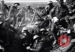 Image of British Mark I tank (male) followed by Allied troops France, 1916, second 48 stock footage video 65675028139