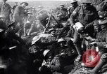 Image of British Mark I tank (male) followed by Allied troops France, 1916, second 49 stock footage video 65675028139