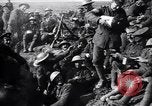 Image of British Mark I tank (male) followed by Allied troops France, 1916, second 50 stock footage video 65675028139