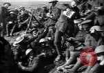 Image of British Mark I tank (male) followed by Allied troops France, 1916, second 51 stock footage video 65675028139