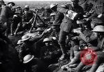 Image of British Mark I tank (male) followed by Allied troops France, 1916, second 53 stock footage video 65675028139