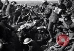 Image of British Mark I tank (male) followed by Allied troops France, 1916, second 54 stock footage video 65675028139