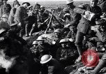 Image of British Mark I tank (male) followed by Allied troops France, 1916, second 55 stock footage video 65675028139
