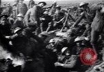 Image of British Mark I tank (male) followed by Allied troops France, 1916, second 57 stock footage video 65675028139