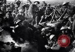 Image of British Mark I tank (male) followed by Allied troops France, 1916, second 58 stock footage video 65675028139