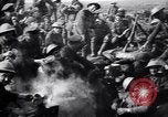Image of British Mark I tank (male) followed by Allied troops France, 1916, second 59 stock footage video 65675028139