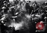 Image of British Mark I tank (male) followed by Allied troops France, 1916, second 60 stock footage video 65675028139