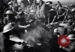 Image of British Mark I tank (male) followed by Allied troops France, 1916, second 61 stock footage video 65675028139