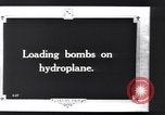 Image of loading bombs aboard a French hydroplane France, 1918, second 5 stock footage video 65675028152