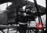 Image of loading bombs aboard a French hydroplane France, 1918, second 28 stock footage video 65675028152