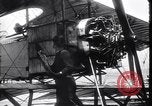Image of loading bombs aboard a French hydroplane France, 1918, second 55 stock footage video 65675028152