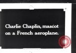 Image of Painting of Charlie Chaplin as the Little Tramp on nose of bomber France, 1918, second 1 stock footage video 65675028154