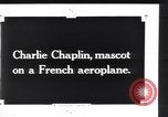 Image of Painting of Charlie Chaplin as the Little Tramp on nose of bomber France, 1918, second 3 stock footage video 65675028154