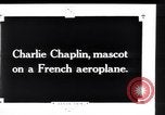 Image of Painting of Charlie Chaplin as the Little Tramp on nose of bomber France, 1918, second 4 stock footage video 65675028154