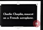 Image of Painting of Charlie Chaplin as the Little Tramp on nose of bomber France, 1918, second 5 stock footage video 65675028154