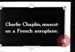Image of Painting of Charlie Chaplin as the Little Tramp on nose of bomber France, 1918, second 6 stock footage video 65675028154