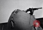 Image of Painting of Charlie Chaplin as the Little Tramp on nose of bomber France, 1918, second 15 stock footage video 65675028154