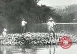 Standbild Männer Philippinen, 1936, aus Sekunde 39 historischem Filmmaterial Videoclip 65675028187