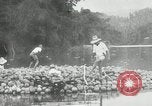 Standbild Männer Philippinen, 1936, aus Sekunde 46 historischem Filmmaterial Videoclip 65675028187