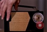 Image of transistor radio United States USA, 1961, second 5 stock footage video 65675028236