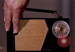 Image of transistor radio United States USA, 1961, second 6 stock footage video 65675028236