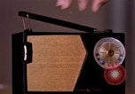 Image of transistor radio United States USA, 1961, second 8 stock footage video 65675028236