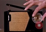 Image of transistor radio United States USA, 1961, second 12 stock footage video 65675028236