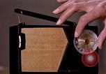 Image of transistor radio United States USA, 1961, second 13 stock footage video 65675028236