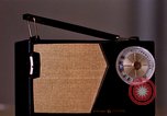 Image of transistor radio United States USA, 1961, second 14 stock footage video 65675028236