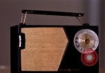 Image of transistor radio United States USA, 1961, second 16 stock footage video 65675028236