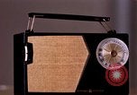 Image of transistor radio United States USA, 1961, second 18 stock footage video 65675028236