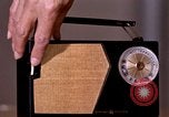 Image of transistor radio United States USA, 1961, second 19 stock footage video 65675028236